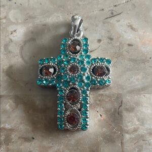 Beautiful necklace pendant cross! Measures 1.5” long. Beautiful teal and topaz!